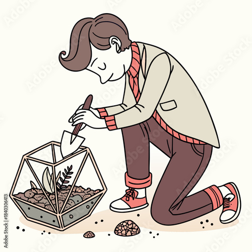 Man designing a terrarium with shovel and small plants
