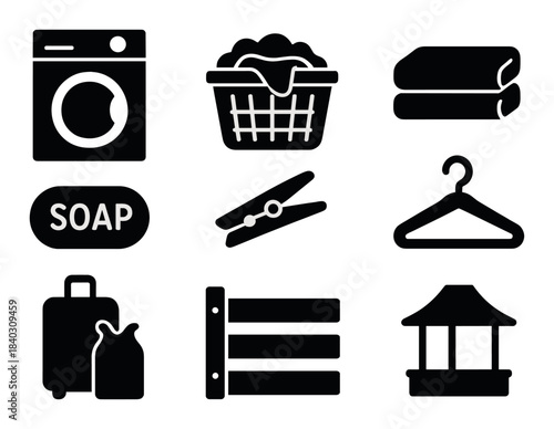 Set of nine laundry and dry cleaning icons in black and white