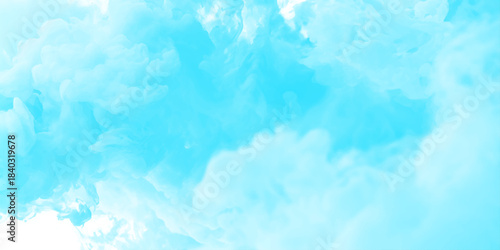 Bright cloudy and shiny winter season or morning blue sky adorned with soft fluffy clouds creating a serene and dreamy atmospheric scene.