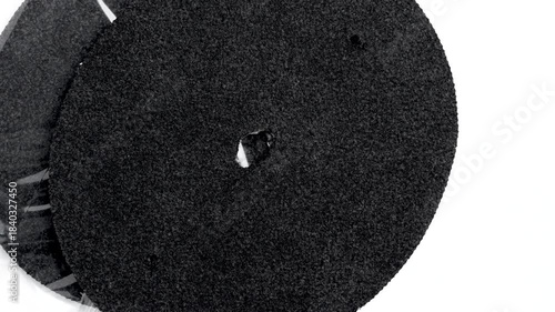 Clean new industrial water filters with black fiber texture on white table