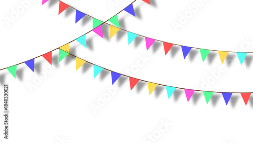 Colorful bunting flags hanging on string with shadows for party celebration decoration