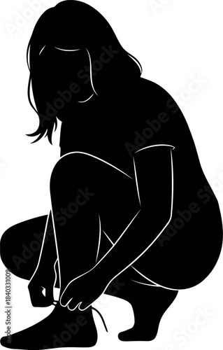 Silhouette of a Woman Tying Shoe Laces in Dynamic Pose