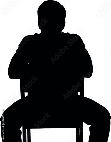 Silhouette of Man Sitting on Chair in Contemplation