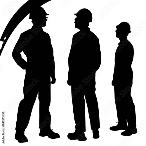 Silhouette of three construction workers in hard hats discussing a project