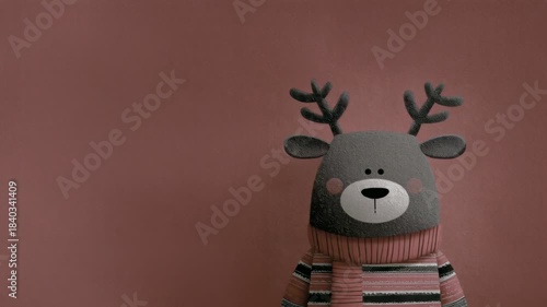Weihnachtshintergrund - Rentier, das mit dem kopf wackelt