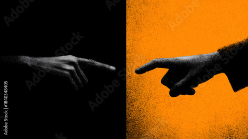 Two pointing hands separated by a stark vertical line contrasting deep shadow and vibrant orange texture symbolizing connection or division