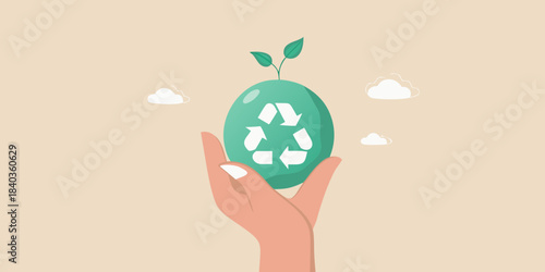 A hand holding an egg shaped object with a recycling symbol