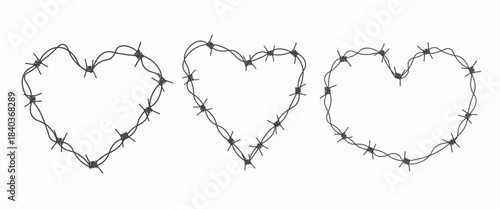 Heart-shaped barbed wire frames with a rough, edgy romantic aesthetic.