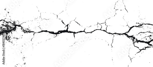 Weathered black and white grunge wall with scratched background. damaged aged stone surface featuring abstract cracked pattern.