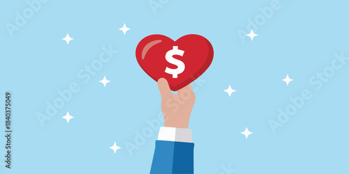 A hand holding a red heart with a dollar sign symbol on it