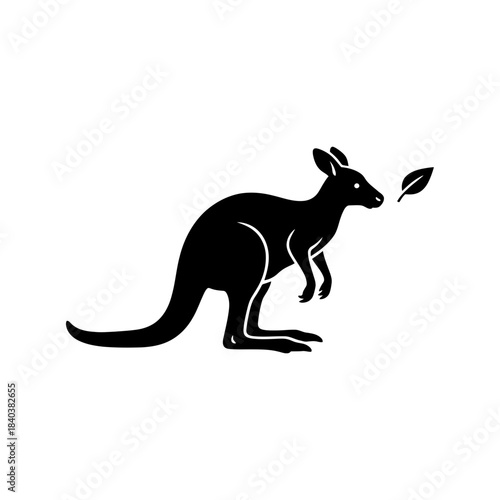 Kangaroo silhouette eating leaf side view vector illustration