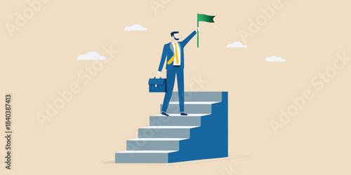 A businessman reaching the top of stairs waving a green flag triumphantly