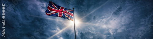 4K HD Ultra Wide Panoramic National Flag Background  - Union Jack flag waving in the wind, dramatic sky