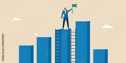 A businessman celebrates success atop a bar graph waving a green flag