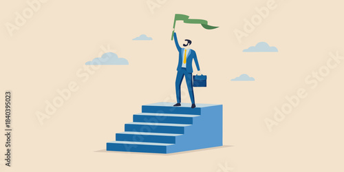 Businessperson celebrating success atop stairs raising a green flag in victory