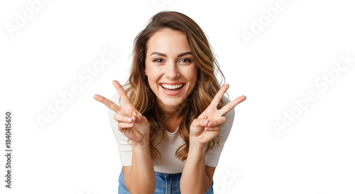 Smiling young woman makes peace signs and fingers crossed gestures full body pose transparent background black background