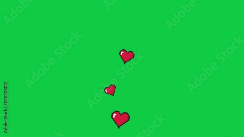 Pixel art hearts on a green screen
