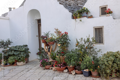 Pictures of Trulli, Italy, showing charming conical-roof houses, cobblestone streets, and historic architecture. Perfect for travel, tourism, lifestyle, and cultural photography.