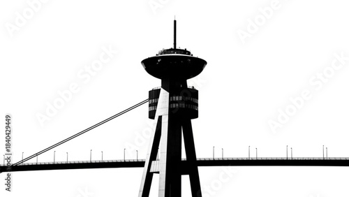 Urban Silhouette: An abstract shot of a towering observation structure, reaching skyward against a bright backdrop, evoking a sense of urban modernism.