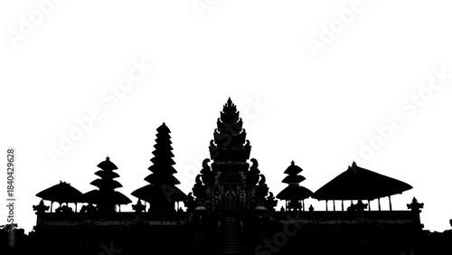 Balinese Temple Silhouette: The silhouette of a traditional Balinese temple, showcasing intricate architecture and cultural heritage against a bright sky.