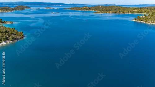 Aerial drone view of Fteroti Beach, sandbanks and lagoon in Sithonia, Chalkidiki, Greece