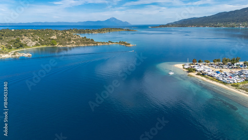 Aerial drone view of Fteroti Beach, sandbanks and lagoon in Sithonia, Chalkidiki, Greece