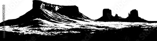 Black and white desert landscape with wind-sculpted formations