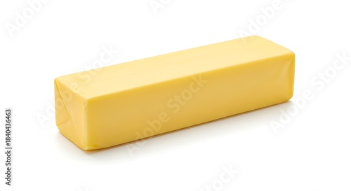 Single stick of butter isolated on white background