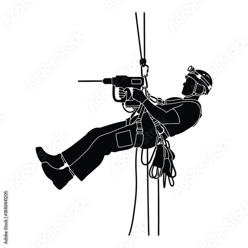 Arborist or worker suspended by rope drilling on