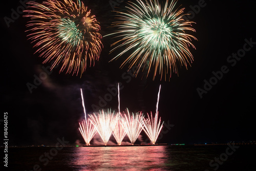 Wonderful fireworks display lights up the night sky, Amazing celebrating the joyous spirit of Christmas and New Year's 