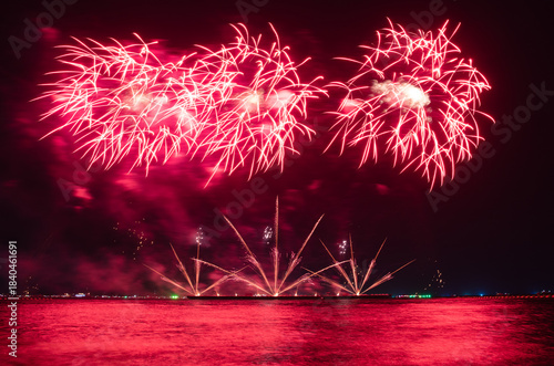 Wonderful fireworks display lights up the night sky, Amazing celebrating the joyous spirit of Christmas and New Year's 