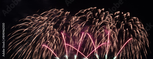 Wonderful fireworks display lights up the night sky, Amazing celebrating the joyous spirit of Christmas and New Year's 