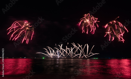 Wonderful fireworks display lights up the night sky, Amazing celebrating the joyous spirit of Christmas and New Year's 