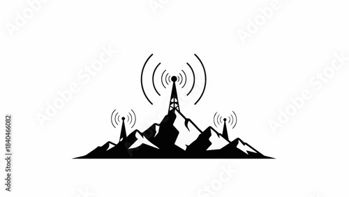 Communication towers on a mountain range transmitting signals across a wide area.