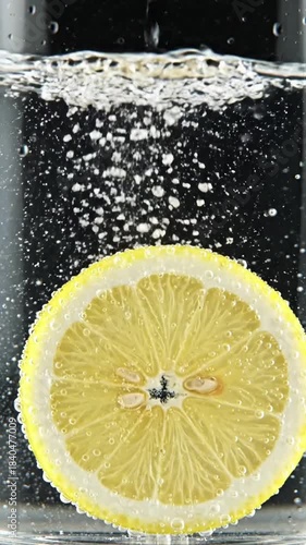 Lemon Slice in Soapy Water Bubble with lemon slice in carbonated water effect macro texture style featuring macro, carbonation,