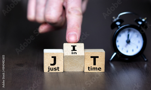 Stock photo showing JIT cubes symbolizing Just-in-Time, supply chain efficiency, lean management, and streamlined production workflows.
