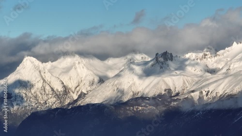 Aerial view cloudy sky over snow-capped Andes mountains in Coyhaique, Chile