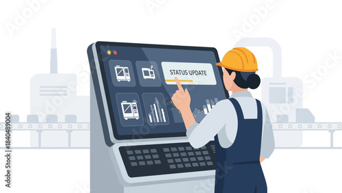 industrial worker monitoring digital status updates on advanced control panel