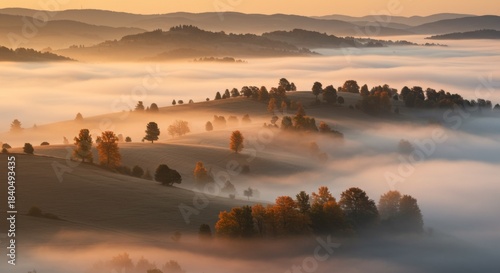 Autumnal Sunrise Over Foggy Hills