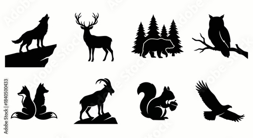Silhouettes of forest animals and wildlife featuring a howling wolf, deer, bear with trees, owl, two foxes, ibex, squirrel with an acorn, and a flying eagle