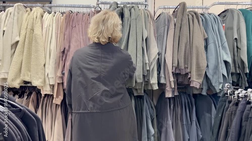 choosing clothes in a shopping mall. clothes hangers