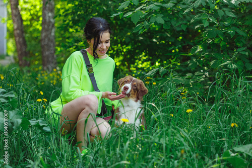 Woman enjoying outdoor time with her dog