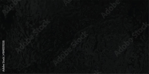 Deep black abstract textured surface with organic molten shapes and subtle reflections creating a dark and mysterious background element