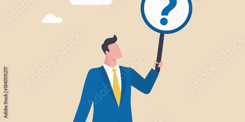 A businessman holding a sign with a question mark seeking answers