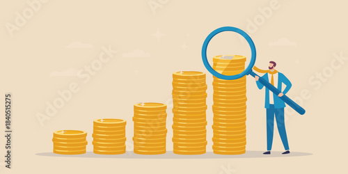 Financial growth and analysis a man examining stacked coins with a magnifying glass