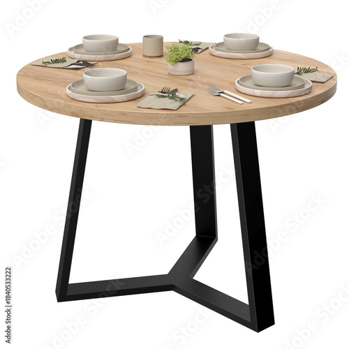 Round wooden loft-style table set for four. Minimalist arrangement of tableware, cutlery, and placemats creates a clean modern look for interior design, dining concepts, and commercial use.