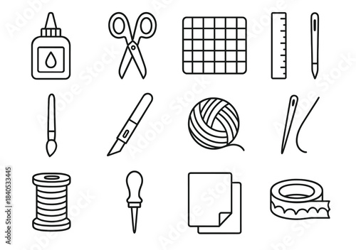 Set of crafting tools and materials: scissors, glue, yarn, tape, ruler, needles, craft knife