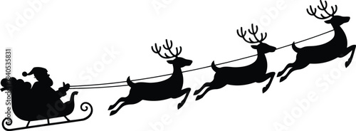 Silhouette of santa claus flying in his sleigh pulled by reindeer