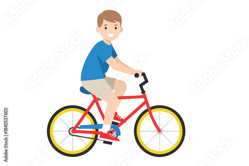 Smiling boy in blue shirt riding a red bicycle with yellow-rimmed wheels