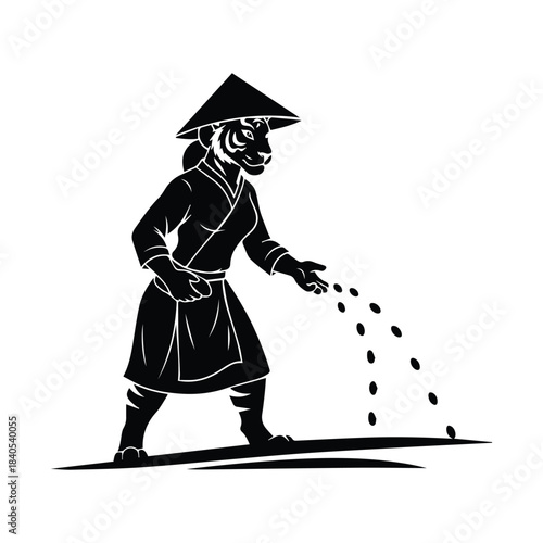 Farmer in traditional conical hat sowing seeds in a field silhouette